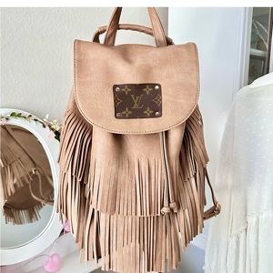 Boutique Fringe bucket backpack